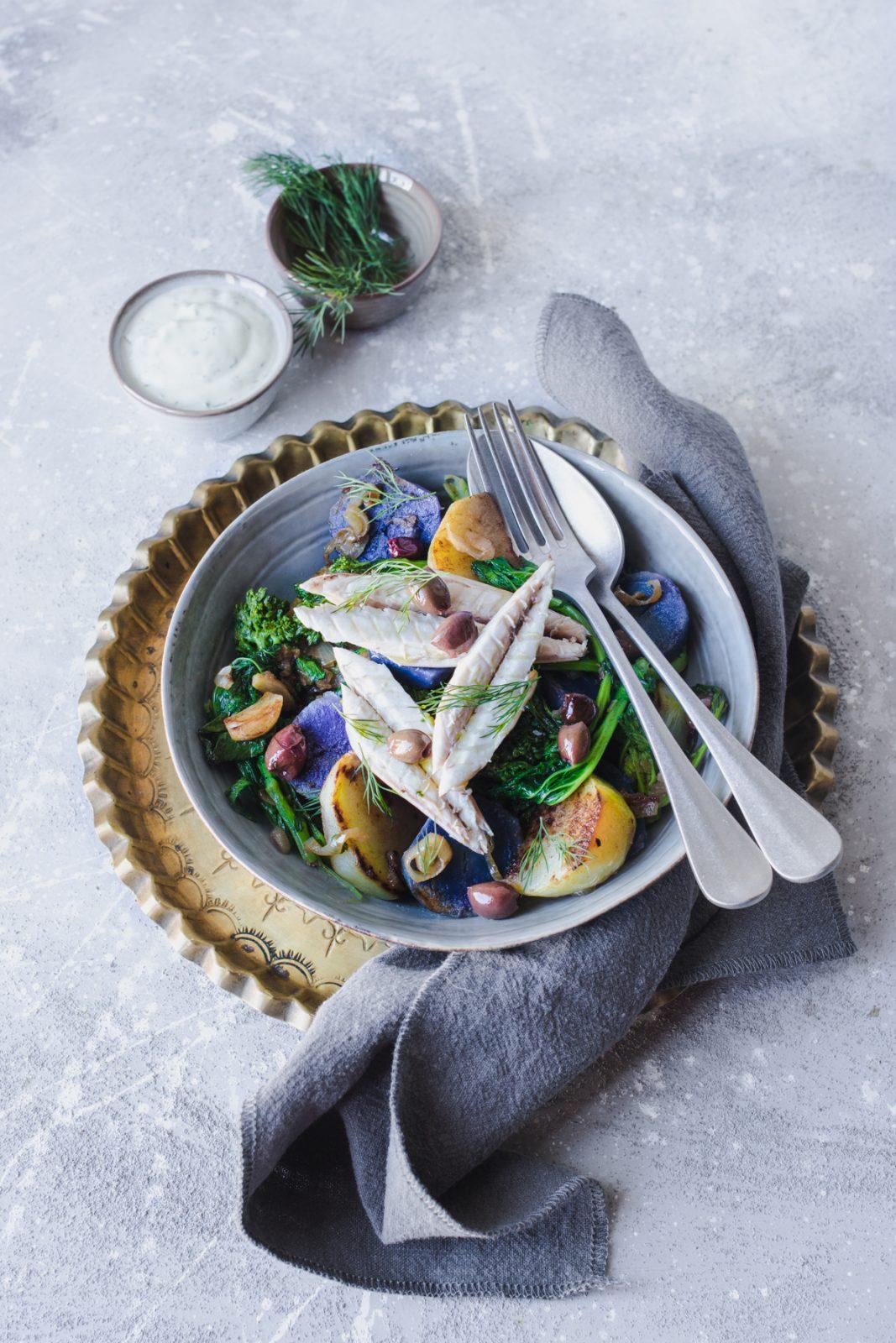 Purple potatoes salad with mackerel, turnip tops and kohlrabi