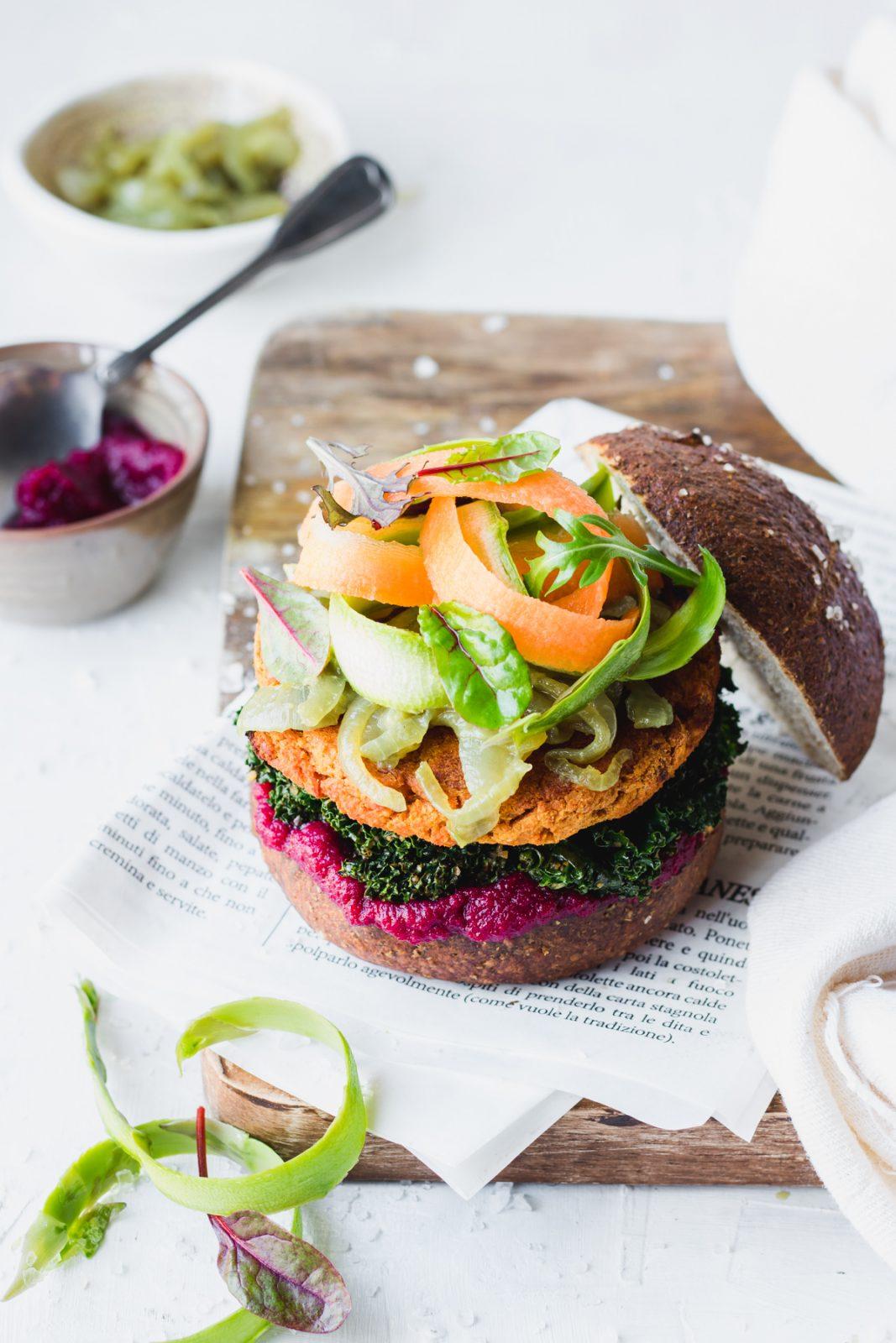 Veg chickpeas burger with beetroot ketchup, caramelized onions and stewed kale